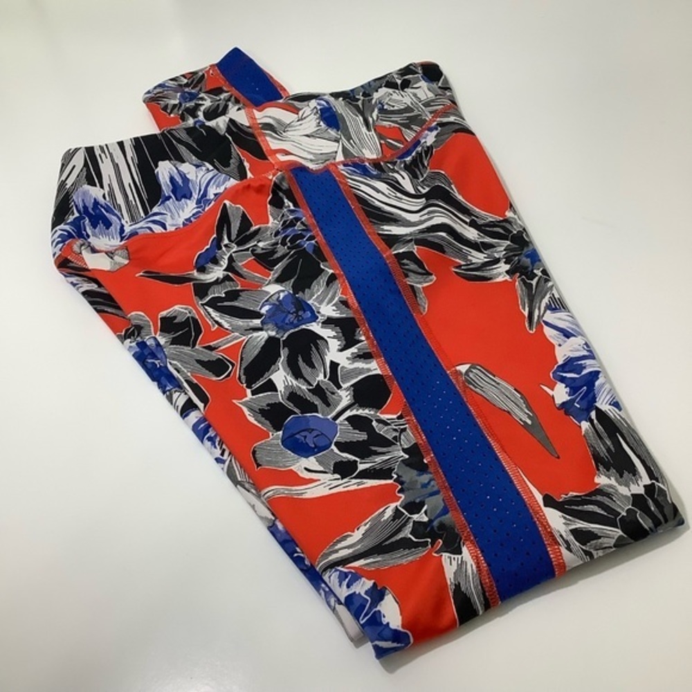 Nike dry fit floral all in running tight laser cut out sides size Small EUC